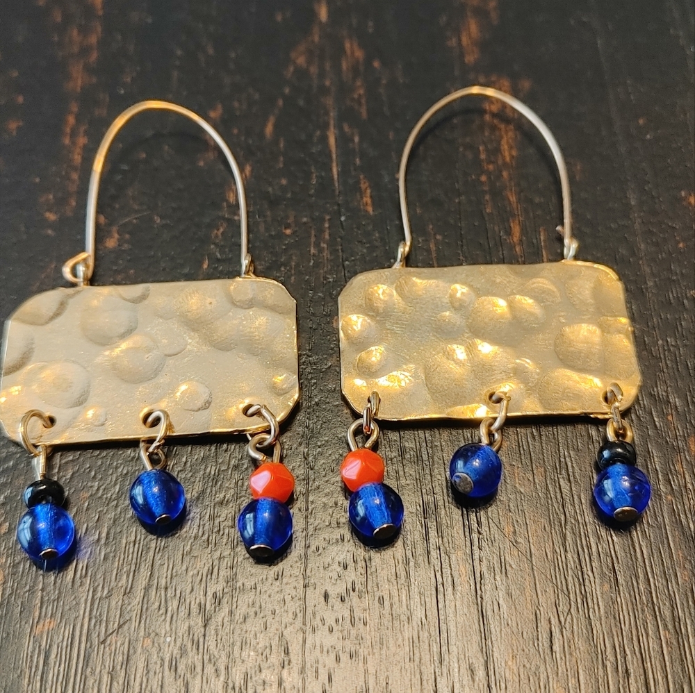 Gold beaded hammered finish earrings.
